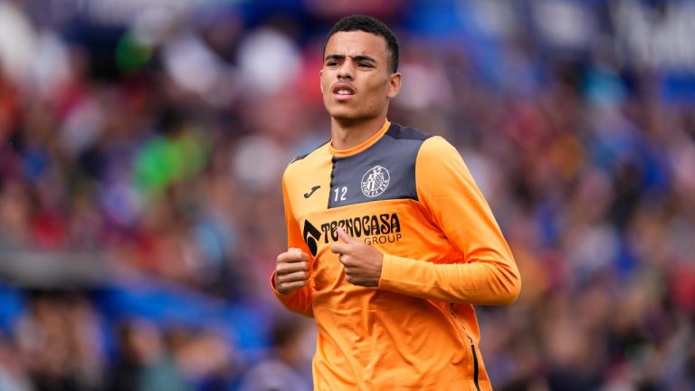 Getafe's Mason Greenwood warms up on the touchline during a Spanish La Liga soccer match between Getafe and Osasuna at the Coliseum stadium in Getafe, Spain, Sunday, Sept. 17, 2023. (Jose Breton/AP)