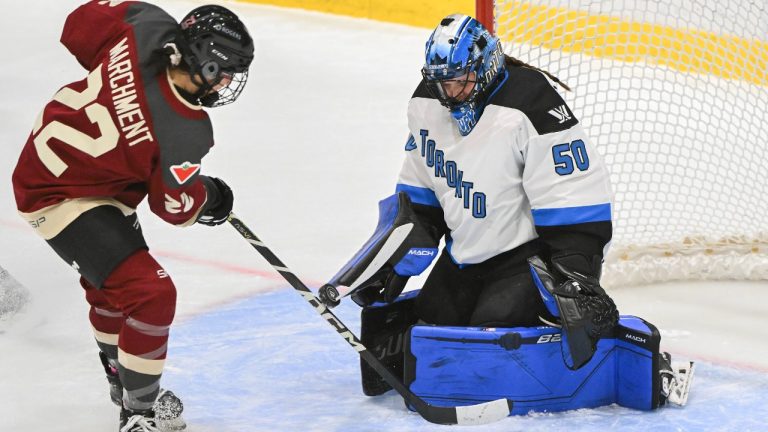 Toronto goaltender Kristen Campbell (50) stops Montreal's Kennedy Marchment during first period PWHL hockey action in Montreal, Saturday, January 20, 2024. (Graham Hughes/CP)