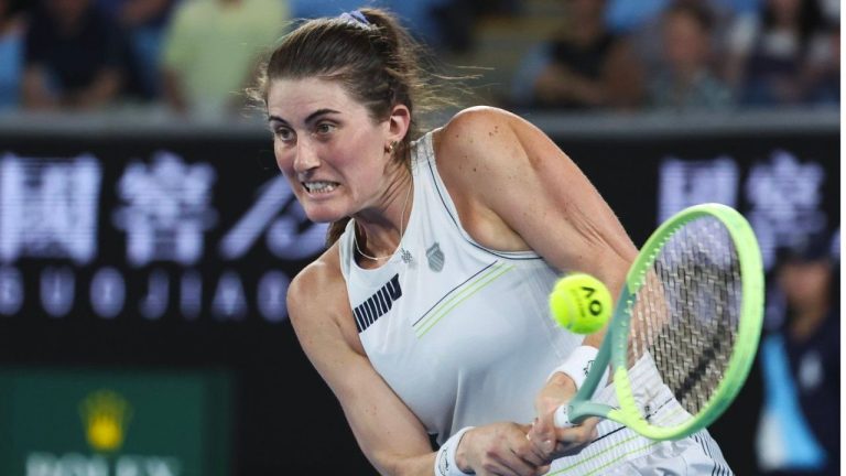 Rebecca Marino of Canada plays a backhand return to Jessica Pegula of the U.S. during their first round match at the Australian Open tennis championships at Melbourne Park, Melbourne, Australia, Tuesday, Jan. 16, 2024. (Asanka Brendon Ratnayake/AP Photo)
