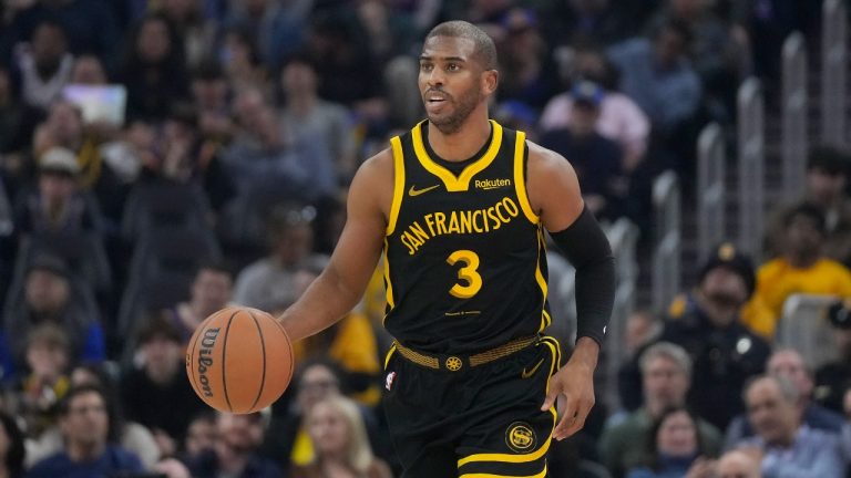 Golden State Warriors guard Chris Paul brings the ball up against the Detroit Pistons during the first half of an NBA basketball game in San Francisco, Friday, Jan. 5, 2024. (Jeff Chiu/AP)