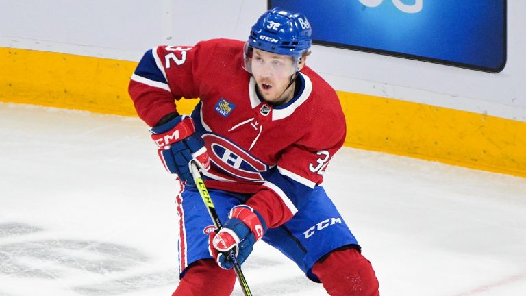 Montreal Canadiens' Rem Pitlick plays a pass to teammate Michael Pezzetta (not shown) leading to a goal against the Boston Bruins during second period NHL hockey action in Montreal, Thursday, April 13, 2023. (Graham Hughes/CP)