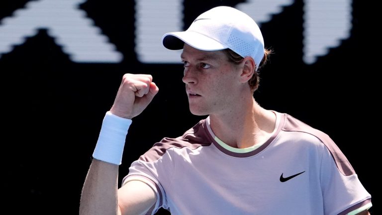 Jannik Sinner of Italy reacts during his semifinal against Novak Djokovic of Serbia at the Australian Open tennis championships at Melbourne Park, Melbourne, Australia, Friday, Jan. 26, 2024. (Andy Wong/AP)