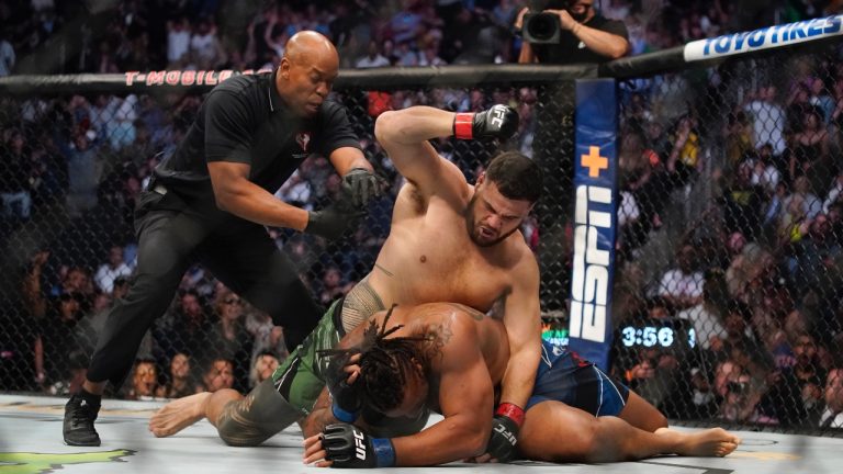 Tai Tuivasa, top, fights Greg Hardy during a UFC 264 heavyweight mixed martial arts bout Saturday, July 10, 2021, in Las Vegas. (John Locher/AP Photo)