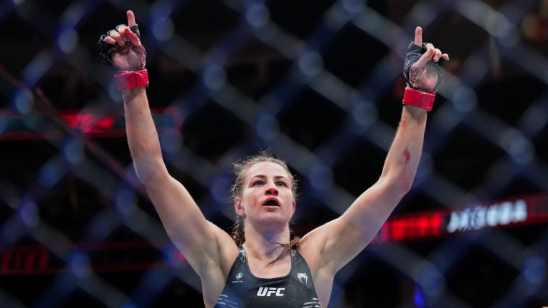 Jasmine Jasudavicius reacts after defeating Priscila Cachoeira during UFC 297 in Toronto on Saturday, January 20, 2024. (Nathan Denette/THE CANADIAN PRESS)