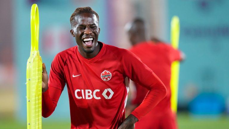 Canada forward Ike Ugbo laughs during practice at the World Cup in Doha, Qatar, Friday, Nov. 25, 2022. (Nathan Denette/CP)