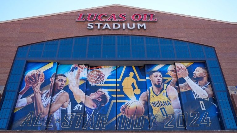 Signage promoting the NBA All-Star basketball game covers the window on Lucas Oil Stadium in Indianapolis, Wednesday, Feb. 14, 2024. The NBA All-Star game in Sunday. (Michael Conroy/AP Photo)