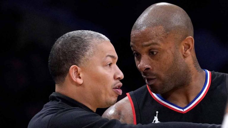 Los Angeles Clippers head coach Tyronn Lue, left, talks with forward P.J. Tucker, center, as guard Russell Westbrook walks away during the second half of an NBA basketball game against the Los Angeles Lakers Wednesday, Nov. 1, 2023, in Los Angeles. (Mark J. Terrill/AP)