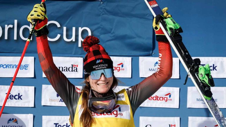 Canada's Brittany Phelan celebrates her third place finish on the podium following the women's final of a World Cup ski cross event at Nakiska Ski Resort in Kananaskis, Alta., Sunday, Jan. 21, 2024. (Jeff McIntosh/CP)