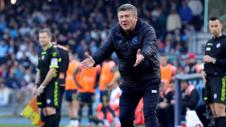 Napoli's head coach Walter Mazzarri reacts during the Serie A soccer match between Napoli and Genoa at the Diego Maradona Stadium in Naples, Italy, Feb. 17, 2024. (Alessandro Garofalo/LaPresse via AP) 