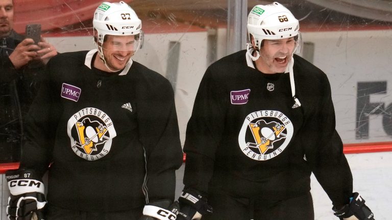 Pittsburgh Penguins' Sidney Crosby (87) shares a laugh with former Penguin Jaromir Jagr during a team workout Saturday, Feb. 17, 2024 in Cranberry, Pa. (AP)