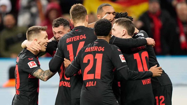 Leverkusen's team players celebrate after Robert Andrich scored his side's second goal during the German Bundesliga soccer match between Bayer 04 Leverkusen and 1. FSV Mainz 05 at the BayArena in Leverkusen, Germany, Friday, Feb. 23, 2024. (Martin Meissner/AP)