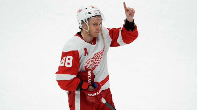 Detroit Red Wings' Patrick Kane celebrates after scoring the winning goal against Chicago Blackhawks goalie Petr Mrazek to win in overtime of an NHL hockey game Sunday, Feb. 25, 2024, in Chicago. (Paul Beaty/AP) 