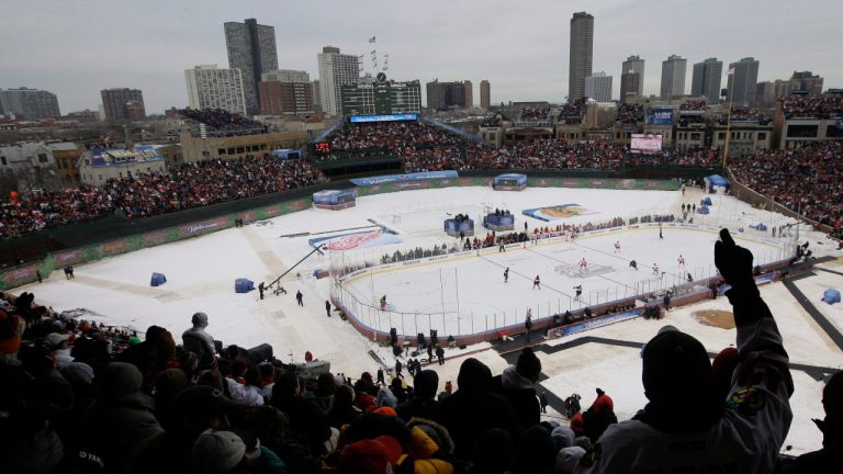 Fans cheer during the first period of the NHL Winter Classic hockey game between the Detroit Red Wings and the Chicago Blackhawks at Wrigley Field, Thursday, Jan. 1, 2009 in Chicago. (M. Spencer Green/AP) 