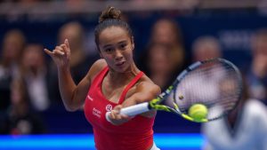 Canada's Leylah Fernandez returns the ball to Czech Republic's Marketa Vondrousova during their semifinal singles tennis match at the Billie Jean King Cup finals at La Cartuja stadium in Seville, southern Spain, Spain, Saturday, Nov. 11, 2023. (Manu Fernandez/AP)