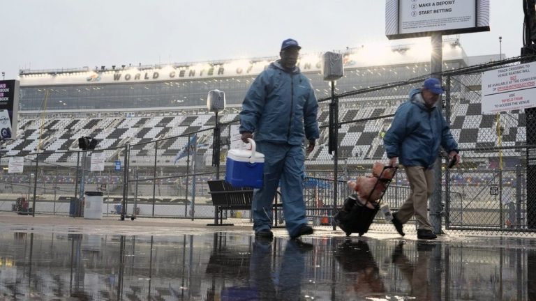 NASCAR has postponed the season-opening Daytona 500 until Monday because of two days of rain at Daytona International Speedway. (AP/John Raoux)