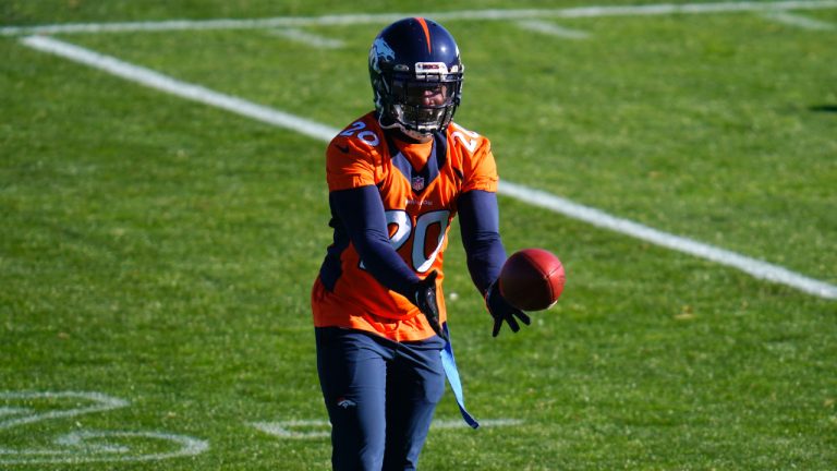 Denver Broncos cornerback Duke Dawson reaches for the ball during the NFL football team's practice Wednesday, Nov. 11, 2020, in Englewood, Colo. (David Zalubowski/AP)