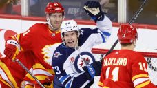 Monahan&#8217;s hat trick not enough as Jets fall to Flames, snap three-game win streak