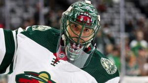 Minnesota Wild goaltender Marc-Andre Fleury (29) warms up while wearing a jersey with patches on the shoulders honoring his 1,000 career NHL games and 552 career wins before of an NHL hockey game against the Pittsburgh Penguins, Friday, Feb. 9, 2024, in St. Paul, Minn. (Matt Krohn/AP)