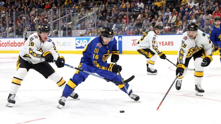 Mitch Marner of the Toronto Maple Leafs protects the puck from Rasmus Dahlin of the Buffalo Sabres and Tomas Hertl of the San Jose Sharks during the game between Team Matthews and Team McDavid during the 2024 Honda NHL All-Star Game on Feb. 3, 2024 in Toronto. (Getty)