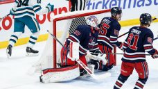 Connor Hellebuyck records 35th career shutout as Jets blank Sharks