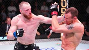 Joe Pyfer punches Jack Hermansson of Sweden in a middleweight fight during the UFC Fight Night event at UFC APEX. (Jeff Bottari/Images)