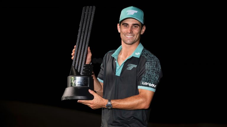 Captain Joaquín Niemann of Torque GC, first place individual champion, celebrates with the trophy after winning in a four-hole playoff during the final round of the LIV Golf Mayakoba at the El Camaleón Golf Course on Sunday, February 04, 2024 in Playa del Carmen, Mexico. (Photo by Montana Pritchard/LIV Golf via AP)