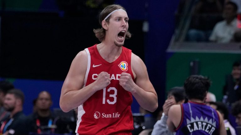 The Canadian men’s basketball team is finally going back to the Olympics, and will be in Group A alongside Australia. (Michael Conroy/AP)