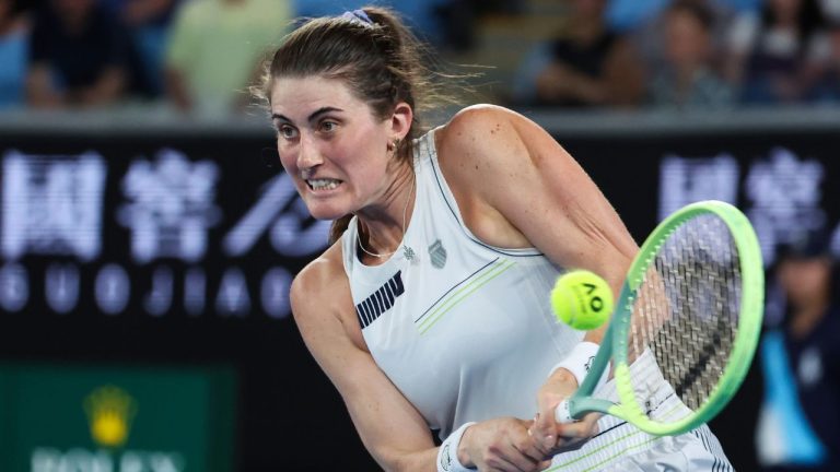 Rebecca Marino plays a backhand return to Jessica Pegula during their first round match at the Australian Open tennis championships at Melbourne Park, Melbourne, Australia, Tuesday, Jan. 16, 2024. (Asanka Brendon Ratnayake/AP Photo)