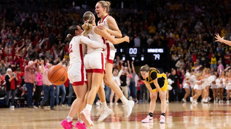 From left to right, Nebraska's Maddie Krull, Jaz Shelley and Natalie Potts celebrate after their win over Iowa in an NCAA college basketball game Sunday, Feb. 11, 2024, in Lincoln, Neb. (Rebecca S. Gratz/AP Photo)