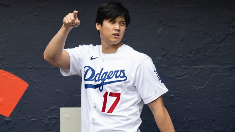 Los Angeles Dodgers' Shohei Ohtani walks to the stage during the team's fan fest in Los Angeles, Saturday, Feb. 3, 2024. (Kyusung Gong/AP)