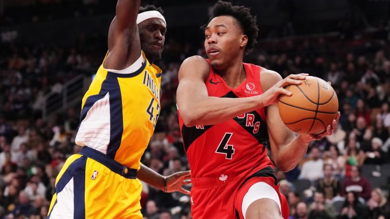 Toronto Raptors forward Scottie Barnes (4) drives past Indiana Pacers forward Pascal Siakam (43) during first half NBA basketball action in Toronto on Wednesday, February 14, 2024. (Chris Young/CP)