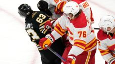 Flames&#8217; Pospisil receives game misconduct for cross-checking Bruins&#8217; Marchand