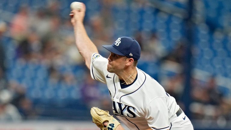 Tampa Bay Rays' Jason Adam pitches to the Colorado Rockies during the eighth inning of a baseball game Thursday, Aug. 24, 2023, in St. Petersburg, Fla. (Chris O'Meara/AP Photo)