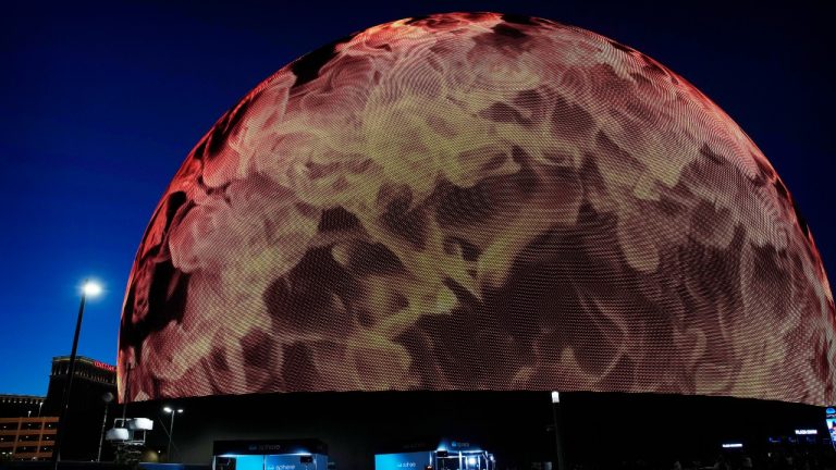 Members of the media wait for celebrities to arrive during the opening night of the Sphere. (John Locher/AP)