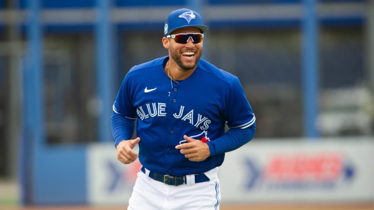 Toronto Blue Jays' George Springer has a laugh before a spring training game against the New York Yankees at TD Ballpark in Dunedin, Fla., Saturday, March 18, 2023. (Mark Taylor/CP)