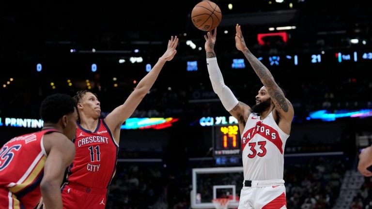 Toronto Raptors guard Gary Trent Jr. (33) shoots against New Orleans Pelicans guard Dyson Daniels (11) in the first half of an NBA basketball game in New Orleans, Monday, Feb. 5, 2024. (Gerald Herbert/AP)