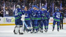 Boeser scores twice, including OT winner, as Canucks beat Bruins