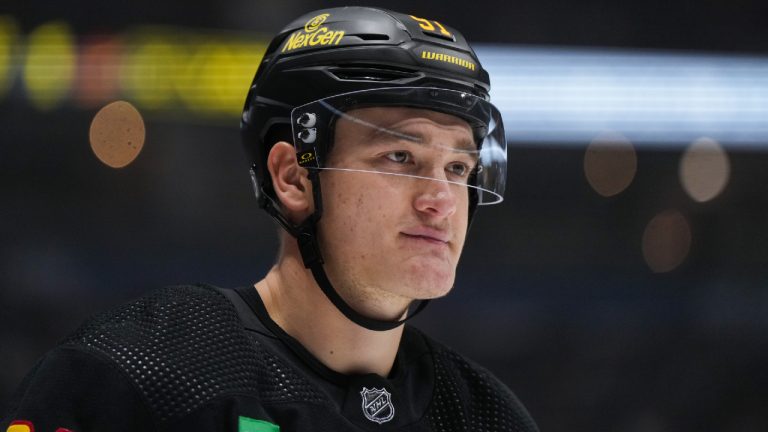 Vancouver Canucks' Nikita Zadorov skates during a stoppage in play during the third period of an NHL hockey game against the Minnesota Wild in Vancouver, on Thursday, December 7, 2023. (Darryl Dyck/CP)