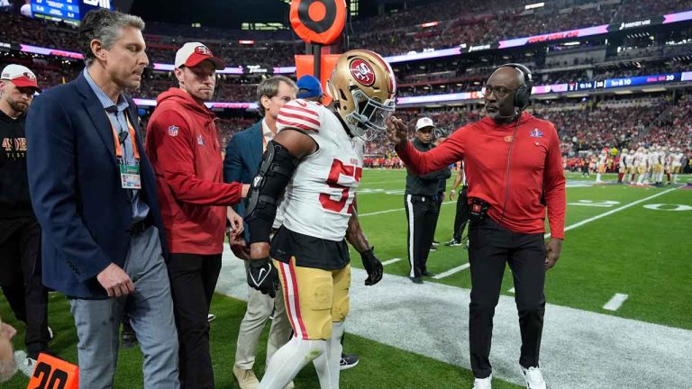 San Francisco 49ers linebacker Dre Greenlaw (57) is helped after an injury against the Kansas City Chiefs during the first half of the NFL Super Bowl 58 football game. (Ashley Landis/AP)