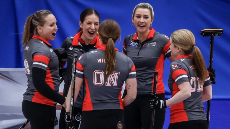 Team Ontario–Homan skip Rachel Homan, left, celebrates with her teammates after defeating Team Manitoba-Jones in Page playoffs at the Scotties Tournament of Hearts in Calgary, Saturday, Feb. 24, 2024. (Jeff McIntosh/CP)