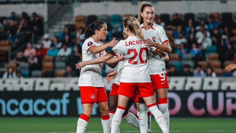 Canada captain Jessie Fleming (left), Cloe Lacasse and Jordyn Huitema (right) celebrate a goal in Canada's 6-0 win over El Salvador in Concacaf W Gold Cup soccer action in Houston in this Thursday, Feb. 22, 2024 handout photo. (CP/HO, Canada Soccer)