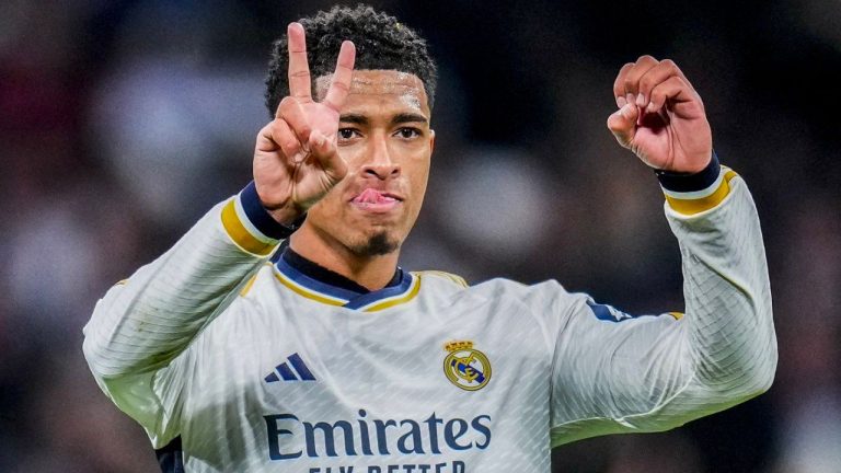 Real Madrid's Jude Bellingham celebrates after scoring his side's third goal during a Spanish La Liga soccer match between Real Madrid and Girona at the Santiago Bernabeu stadium in Madrid, Spain, Saturday, Feb. 10, 2024. (Manu Fernandez/AP Photo)
