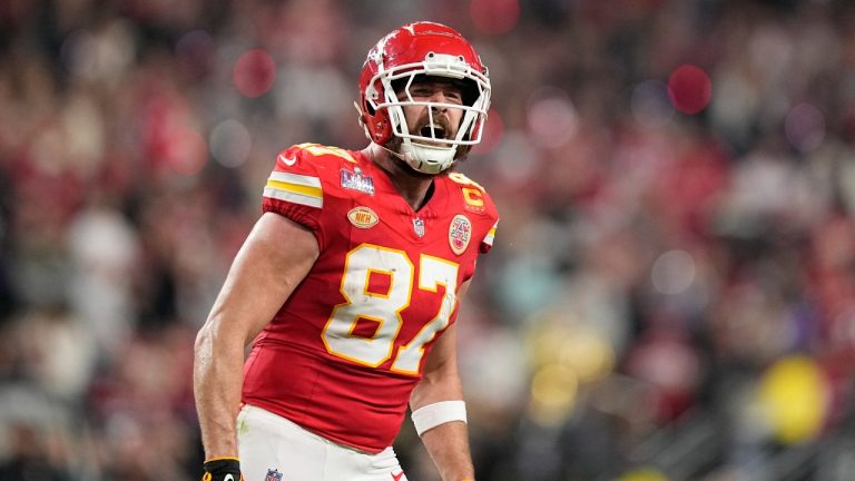 The start of the NFL opener between the Baltimore Ravens and Kansas City Chiefs was delayed by 20 minutes due to a brief storm. (Brynn Anderson/AP)