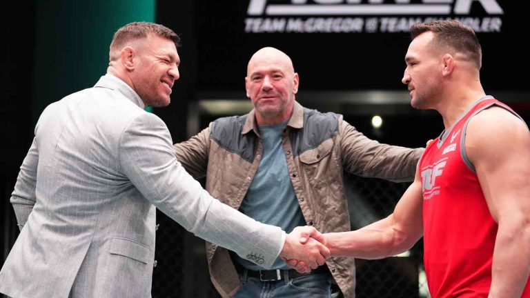 Conor McGregor and Michael Chandler shake hands during the filming of The Ultimate Fighter at UFC APEX. (Chris Unger/Getty Images)