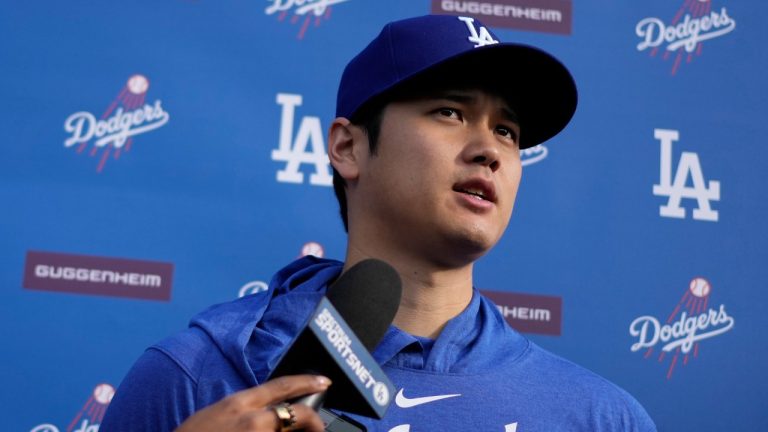 Los Angeles Dodgers' Shohei Ohtani speaks to media at Camelback Ranch in Phoenix, Friday, Feb. 9, 2024. (Carolyn Kaster/AP)