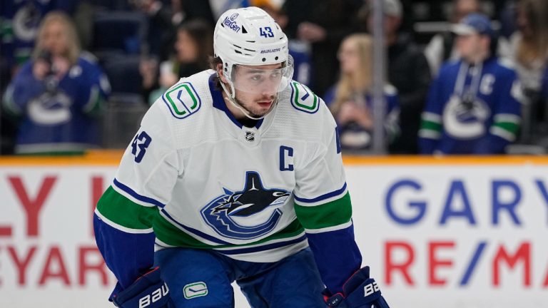 Vancouver Canucks defenseman Quinn Hughes (43) warms up before the team's NHL hockey game against the Nashville Predators, Tuesday, Dec. 19, 2023, in Nashville, Tenn. (George Walker IV/AP)