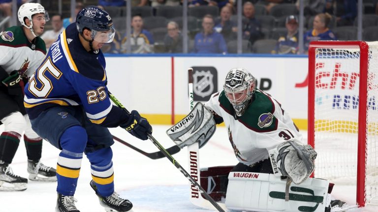 Arizona Coyotes goalie Matt Villalta (31) blocks St. Louis Blues forward Jordan Kyrou (25) from scoring during the first period of a preseason NHL hockey game, Saturday, Sept. 23, 2023, at Enterprise Center in St. Louis, Mo. (Christine Tannous/St. Louis Post-Dispatch via AP)