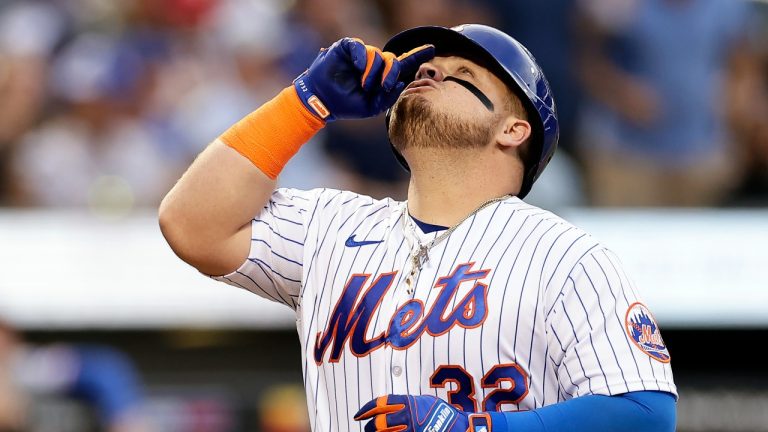 New York Mets designated hitter Daniel Vogelbach reacts after hitting a home run against the Texas Rangers during the second inning of a baseball game Wednesday, Aug. 30, 2023, in New York. (Adam Hunger/AP Photo)