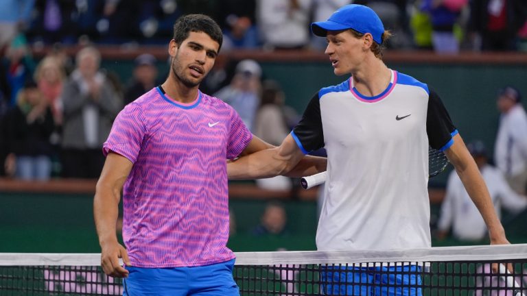 Carlos Alcaraz, of Spain, left, talks with Jannik Sinner, of Italy, after defeating him in a semifinal match at the BNP Paribas Open tennis tournament, Saturday, March 16, 2024, in Indian Wells, Calif. (Ryan Sun/AP)