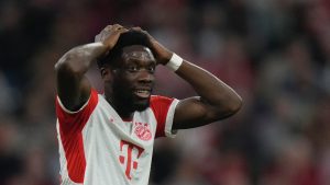 Bayern's Alphonso Davies reacts during the German Bundesliga soccer match between FC Bayern Munich and SC Freiburg at the Allianz Arena stadium. (Matthias Schrader/AP)